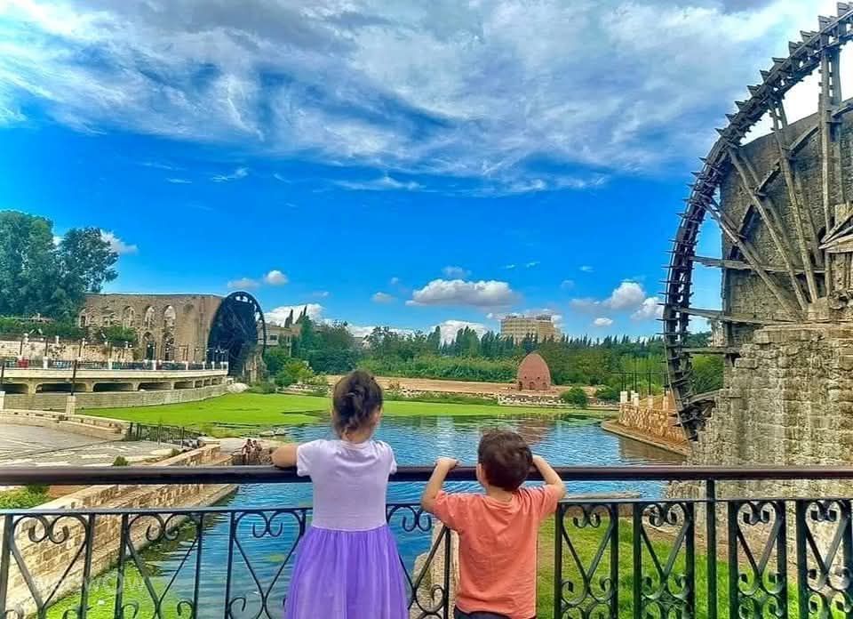 Fotografos Abo_Malek, Fotos do tempo em Ḩamāh - Weawow